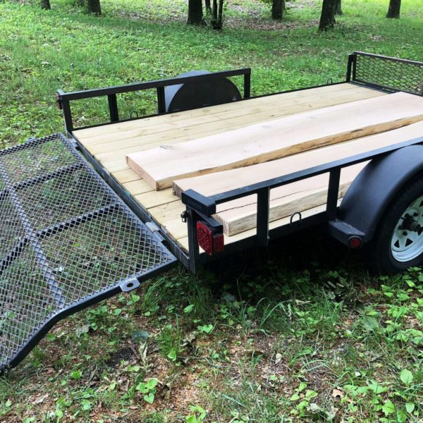 Wood for live edge bar getting trailered into Chicago for new craft beer bar