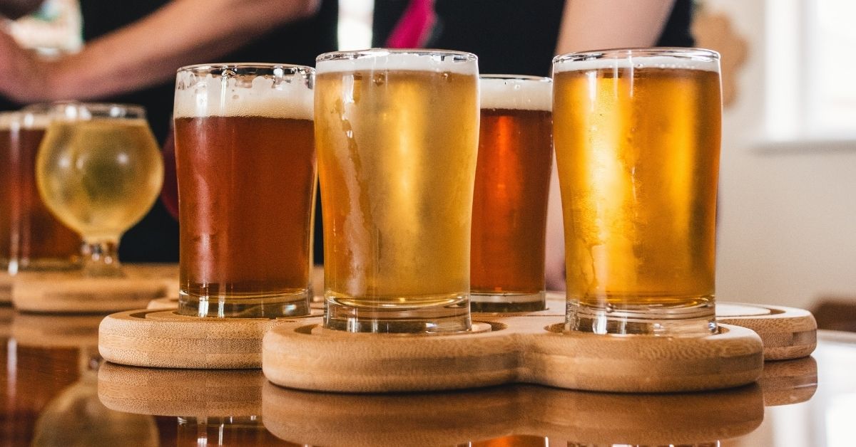 Beers poured in glasses at Chicago taproom